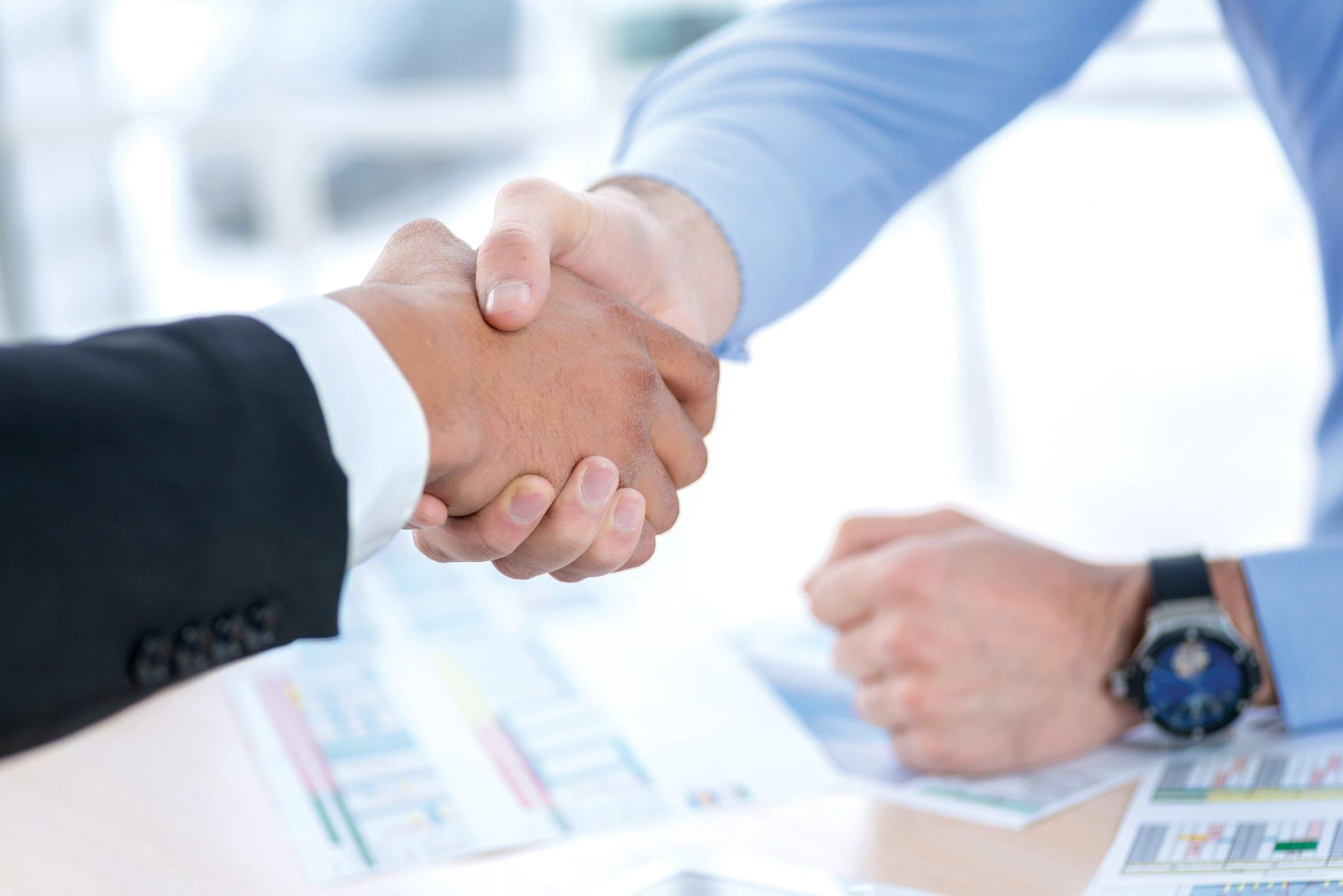 business persons shaking hands